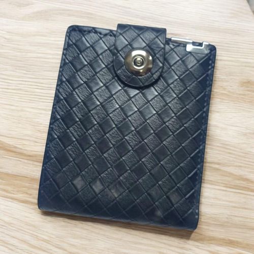 A very elegant and elegant triangular embossed leather wallet