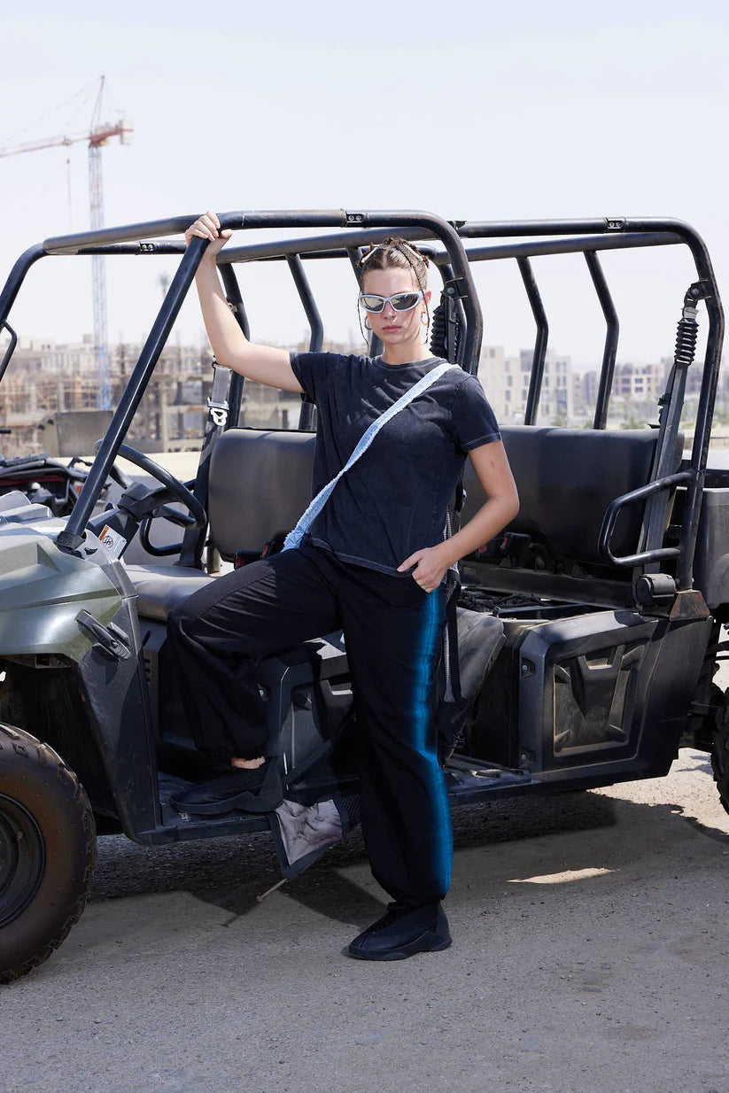 PARACHUTE PANTS IN BLACK with blue lines